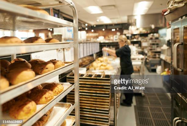 get your carb fix here - baking bread imagens e fotografias de stock