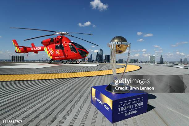 The ICC Cricket World Cup is seen by a London Air Ambulance during the ICC Cricket World Cup Trophy Tour on May 12, 2019 in London, England.London’s...