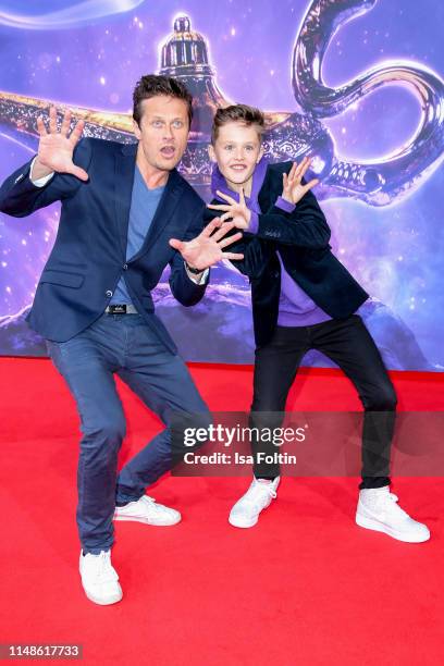German actor Roman Knizka and his son Leo Knizka attend the movie premiere of "Aladdin" at UCI Luxe Mercedes Platz on May 11, 2019 in Berlin, Germany.
