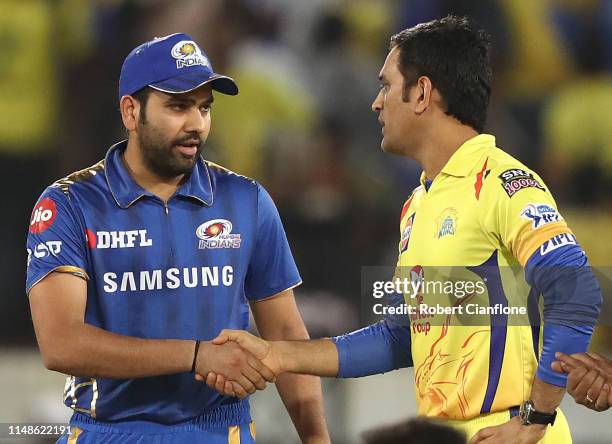 Rohit Sharma of the Mumbai Indians and MS Dhoni of the Chennai Super Kings are seen at the coin toss during the Indian Premier League Final match...