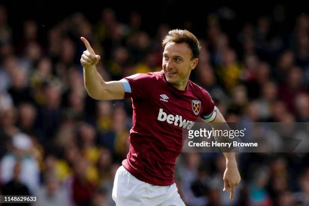 Mark Noble of West Ham United celebrates after scoring his team's first goal during the Premier League match between Watford FC and West Ham United...