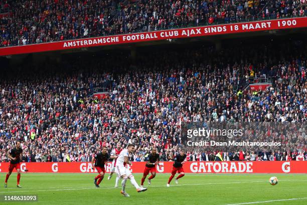 Dusan Tadic of Ajax scores his team's fourth goal from the penalty spot during the Eredivisie match between Ajax and Utrecht at Johan Cruyff Arena on...