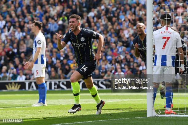 Aymeric Laporte of Manchester City celebrates after scoring his team's second goal during the Premier League match between Brighton & Hove Albion and...