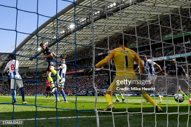 Aymeric Laporte of Manchester City scores his team's second goal during the Premier League match between Brighton & Hove Albion and Manchester City...