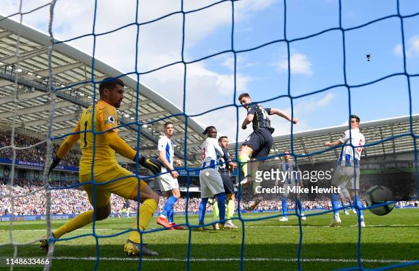 Aymeric Laporte of Manchester City scores his team's second goal during the Premier League match between Brighton & Hove Albion and Manchester City...