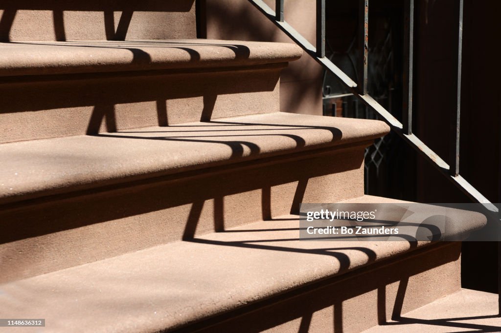 Brownstone steps to a townhouse in midtown Manhattan, NYC