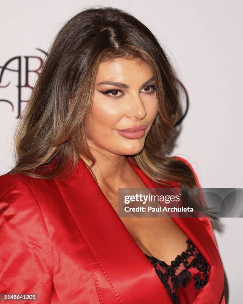Model Angela Martini attends the Hilary Roberts birthday celebration and the Red Songbird Foundation launch party at The Beverly Hilton Hotel on May...