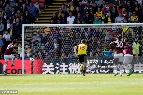 Mark Noble of West Ham United scores his team's fourth goal during the Premier League match between Watford FC and West Ham United at Vicarage Road...