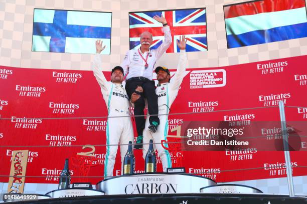 Race winner Lewis Hamilton of Great Britain and Mercedes GP and second place finisher Valtteri Bottas of Finland and Mercedes GP celebrate on the...