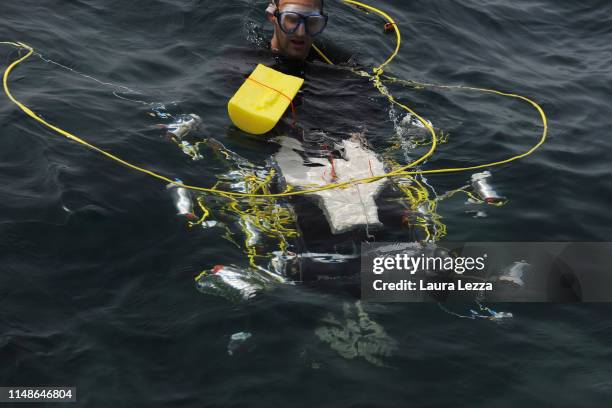 The Crab Robot in search of plastic is displayed during its very first dive in the sea off the Italian Coast at the Meloria on June 8, 2019 in...