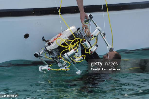 The Crab Robot in search of plastic is displayed during its very first dive in the sea off the Italian Coast at the Meloria on June 8, 2019 in...