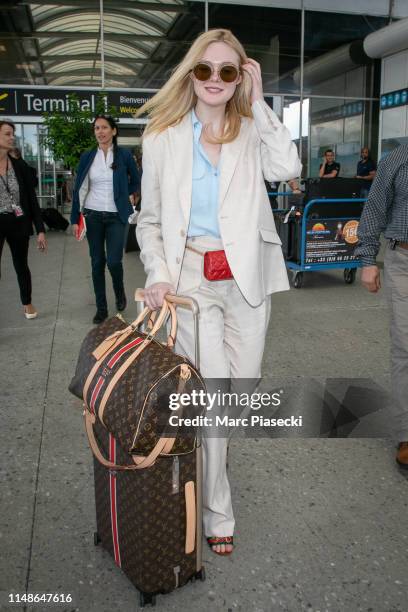 Actress Elle Fanning arrives ahead of the 72nd annual Cannes Film Festival at Nice Airport on May 12, 2019 in Nice, France.