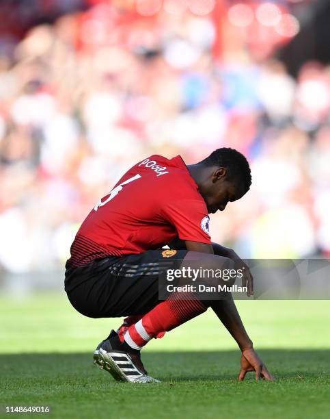 Paul Pogba of Manchester United looks dejected following his side's defeat during the Premier League match between Manchester United and Cardiff City...