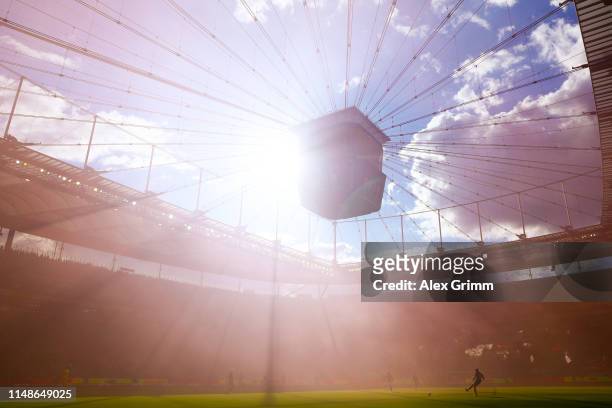 Genral view of the action as purple smoke from flares fill the air during the Bundesliga match between Eintracht Frankfurt and 1. FSV Mainz 05 at...
