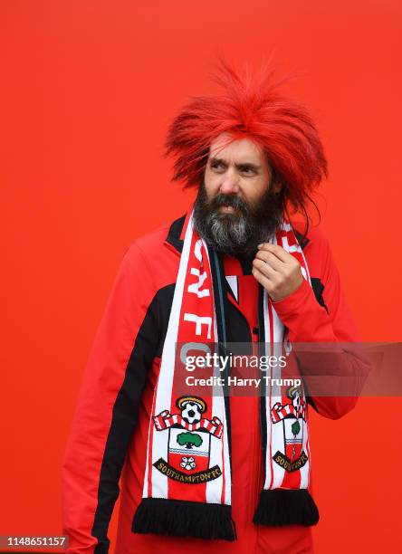 Southampton fan looks on prior to kick off during the Premier League match between Southampton FC and Huddersfield Town at St Mary's Stadium on May...