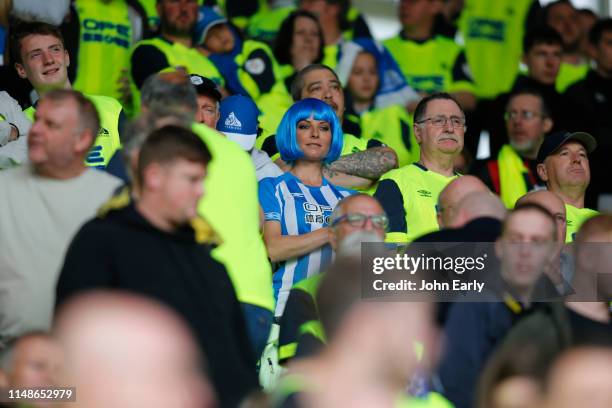 Fan of Huddersfield Town watches on during the Premier League match between Southampton FC and Huddersfield Town at St Mary's Stadium on May 12, 2019...