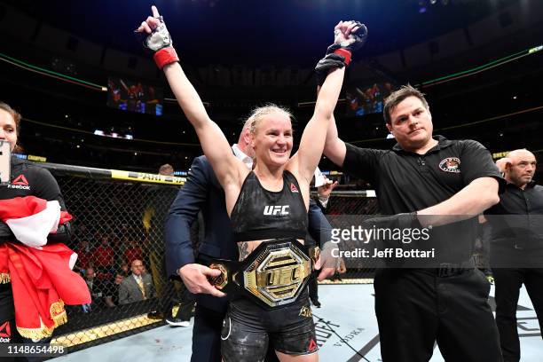 Valentina Shevchenko of Kyrgyzstan celebrates her KO victory over Jessica Eye in their women's flyweight championship bout during the UFC 238 event...