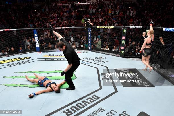 Valentina Shevchenko of Kyrgyzstan celebrates her KO victory over Jessica Eye in their women's flyweight championship bout during the UFC 238 event...