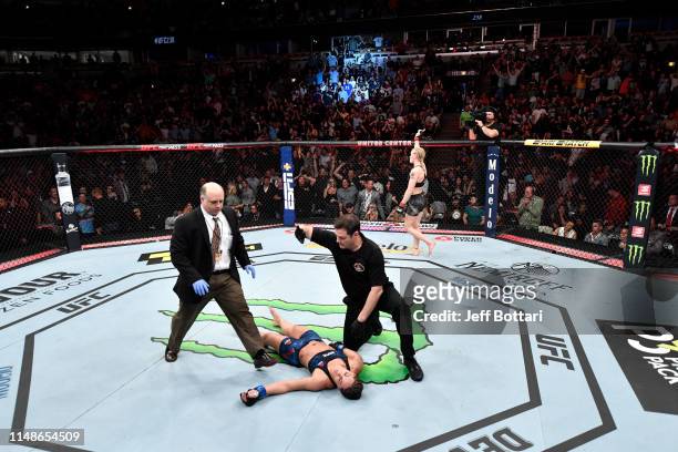Valentina Shevchenko of Kyrgyzstan celebrates her KO victory over Jessica Eye in their women's flyweight championship bout during the UFC 238 event...