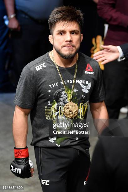 Henry Cejudo prepares to enter the Octagon prior to his bantamweight championship bout against Marlon Moraes of Brazil during the UFC 238 event at...