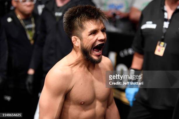 Henry Cejudo prepares to enter the Octagon prior to his bantamweight championship bout against Marlon Moraes of Brazil during the UFC 238 event at...