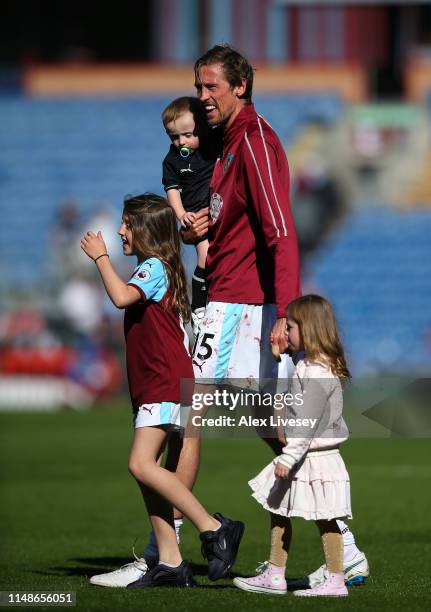 Peter Crouch of Burnley is seen with his children after the Premier League match between Burnley FC and Arsenal FC at Turf Moor on May 12, 2019 in...