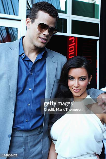 Kim Kardashian and Kris Humphries attend the Amber Fashion Show held at the Meridien Beach Plaza on May 27, 2011 in Monte Carlo, Monaco.