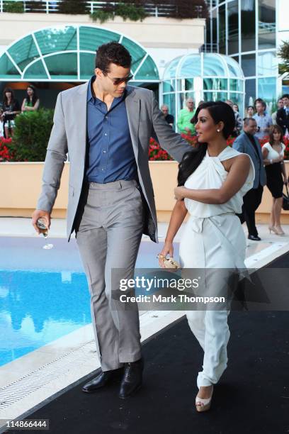 Kim Kardashian and Kris Humphries attend the Amber Fashion Show held at the Meridien Beach Plaza on May 27, 2011 in Monte Carlo, Monaco.