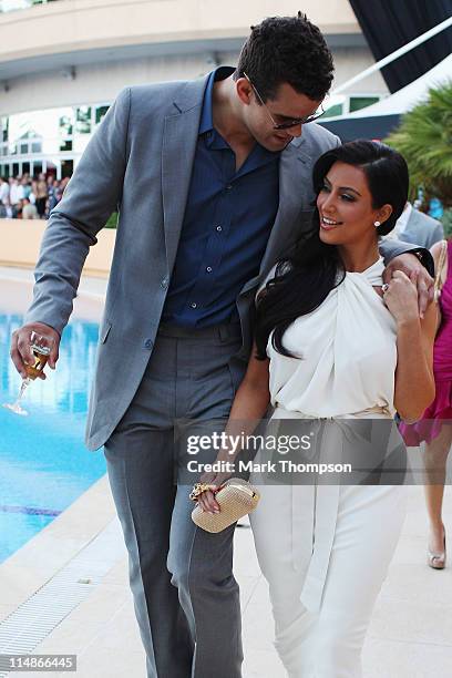 Kim Kardashian and Kris Humphries attend the Amber Fashion Show held at the Meridien Beach Plaza on May 27, 2011 in Monte Carlo, Monaco.