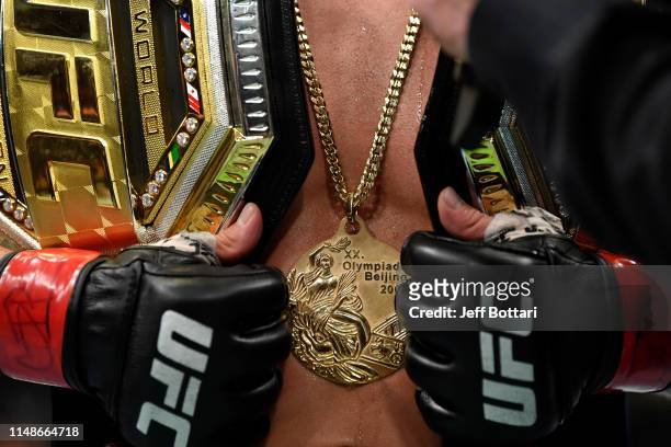 Detail shot of Henry Cejudo's Olympic gold medal after his TKO victory over Marlon Moraes of Brazil in their bantamweight championship bout during...