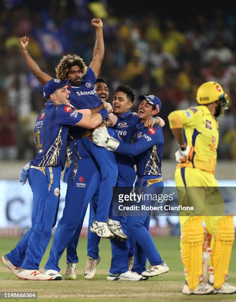 The Mumbai Indians celebrate after they defeated the Chennai Super Kings during the Indian Premier League Final match between the the Mumbai Indians...
