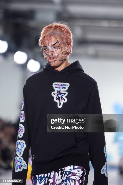 Model presents a new Spring/Summer 2020 Liam Hodges collection during London Fashion Weak Mens in the old Trumans Brewery show space in London on the...