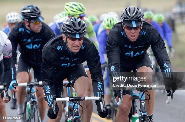 Kurt-Asle Arvesen of Norway and teammate Ian Stannard of Great Britain riding for Sky Procycling drive the peloton during stage three of the 2011...