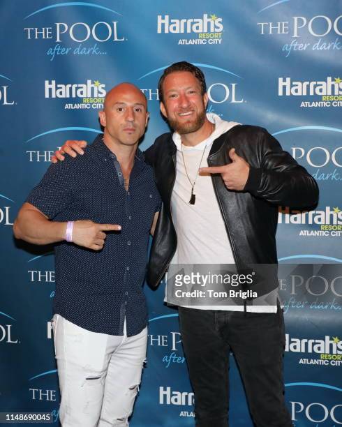David Portnoy of Barstool Sports poses with Lillo Brancato Jr while hosting The Pool After Dark at Harrah's Resort on Saturday May 11, 2019 in...