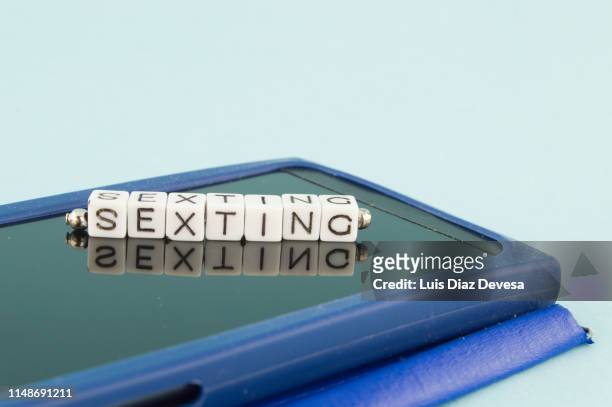 some people are using their smartphone to commit sexting - facebook killer stock pictures, royalty-free photos & images