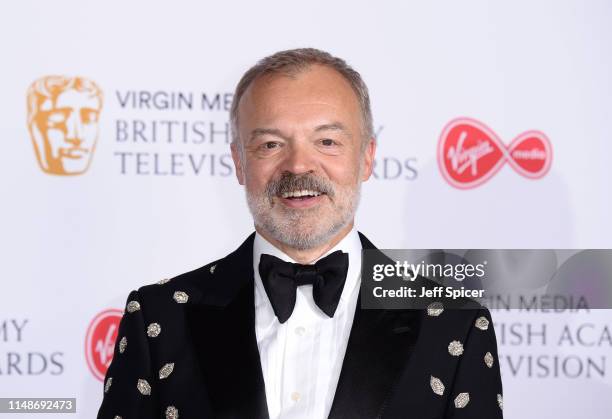 Host Graham Norton in the Press Room at the Virgin TV BAFTA Television Award at The Royal Festival Hall on May 12, 2019 in London, England.