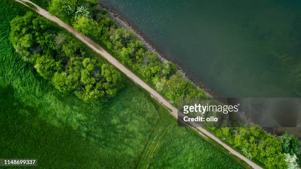 riverbank - aerial view - by the river stock pictures, royalty-free photos & images