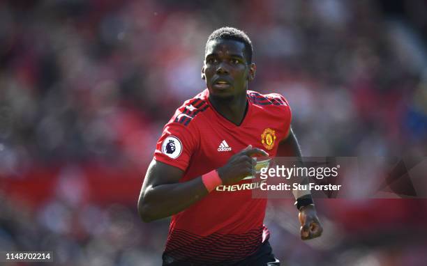 United player Paul Pogba in action during the Premier League match between Manchester United and Cardiff City at Old Trafford on May 12, 2019 in...