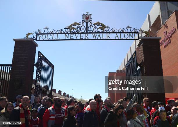 General view outside the stadium as fans wait by the gates ahead of the Premier League match between Liverpool FC and Wolverhampton Wanderers at...