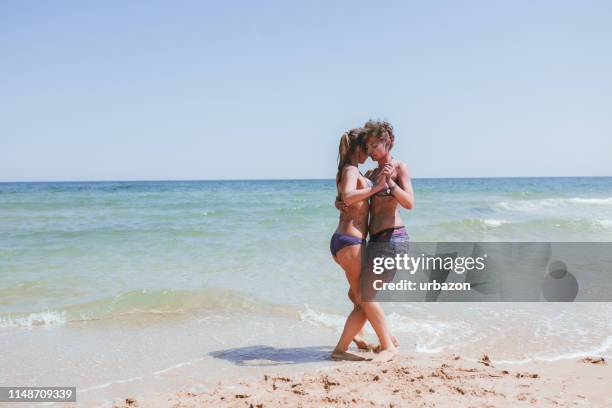 dancing on the beach with face paint - salsa dancer stock pictures, royalty-free photos & images