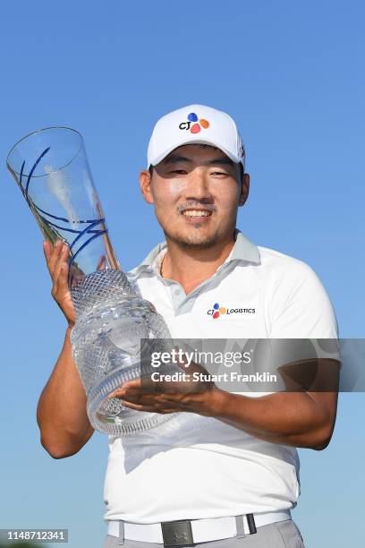 Sung Kang of Korea poses for a photo with the trophy after winning the AT&T Byron Nelson at Trinity Forest Golf Club on May 12, 2019 in Dallas, Texas.