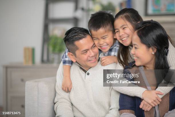 young family - family filipino stock pictures, royalty-free photos & images