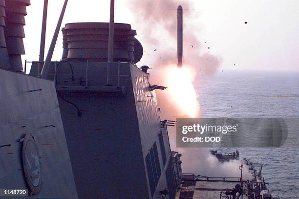 One of eight Tomahawk cruise missiles launches from the stern of the USS Laboon to attack selected air defense targets in Iraq on Sept. 3, 1996....