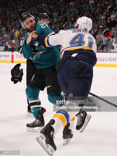 Barclay Goodrow of the San Jose Sharks fights with Robert Bortuzzo of the St. Louis Blues in Game One NHL Western Conference Final during the 2019...