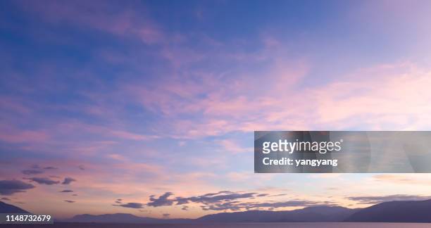 golden  sunset  background - purple sunset stock pictures, royalty-free photos & images