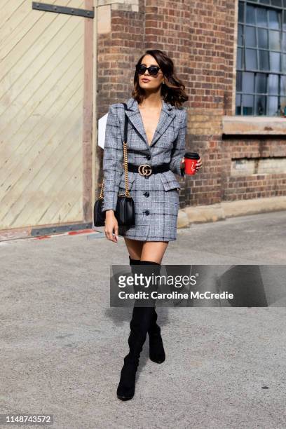 Erin Holland wearing Elliat suit, Chanel bag and Tony Bianco shoes at Mercedes-Benz Fashion Week Resort 20 Collections on May 13, 2019 in Sydney,...