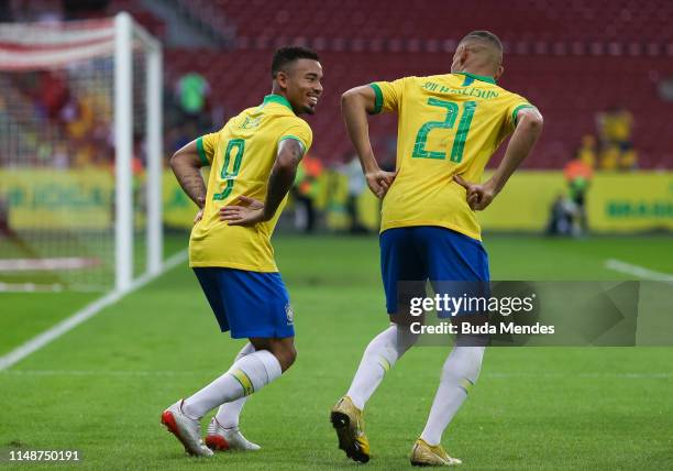 Gabriel Jesus and Richarlison of Brazil celebrate a scored goal during the International Friendly Match between Brazil and Honduras at Beira Rio...