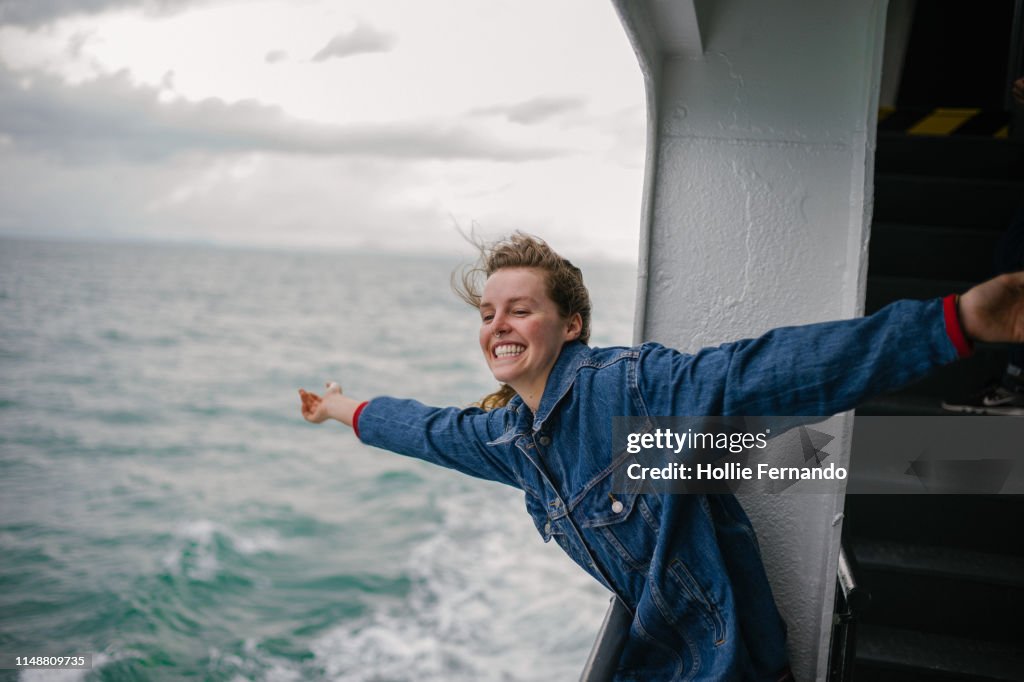 Young Woman Enjoying Life on Ferry 2