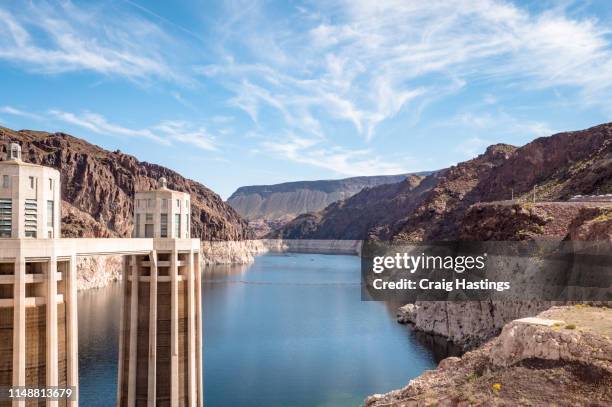 hoover dam, usa - april 15, 2019: view of hoover dam las vegas nevada, lake mead running into the colorado river through the hydroelectric power plant - hoover dam ストックフォトと画像