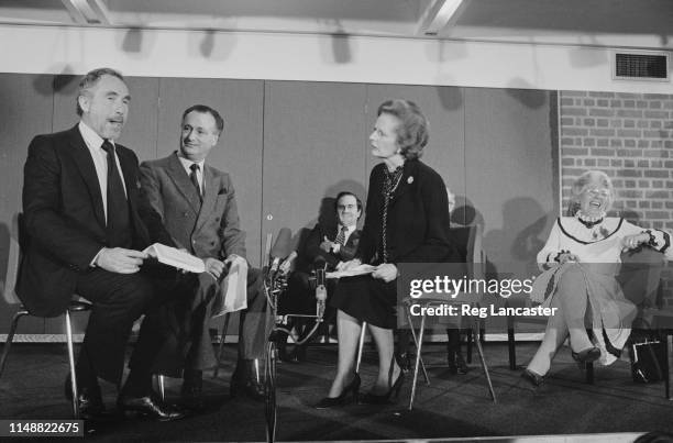 British Prime Minister Margaret Thatcher performing a short sketch with Paul Eddington and Nigel Hawthorne at a ceremony where the writers were...